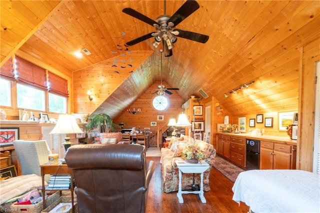 living room with lofted ceiling, ceiling fan, wood walls, and dark hardwood / wood-style floors