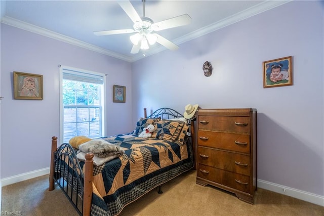 bedroom featuring ornamental molding, light colored carpet, and ceiling fan