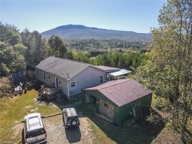 drone / aerial view featuring a mountain view