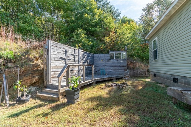 view of yard featuring a deck