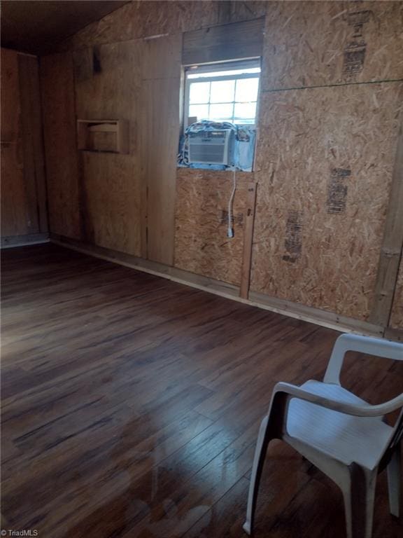 empty room featuring dark hardwood / wood-style flooring