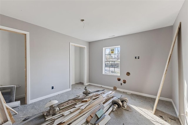 unfurnished bedroom with baseboards