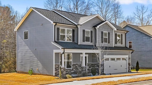 craftsman inspired home with a garage