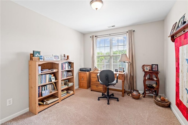 office featuring carpet and baseboards