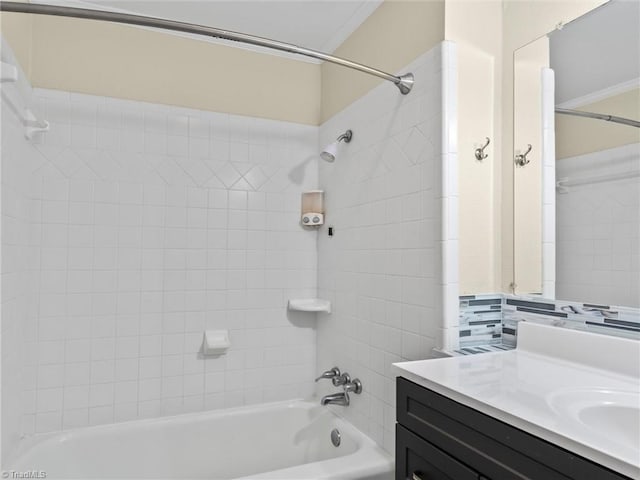 full bath featuring vanity, crown molding, and  shower combination