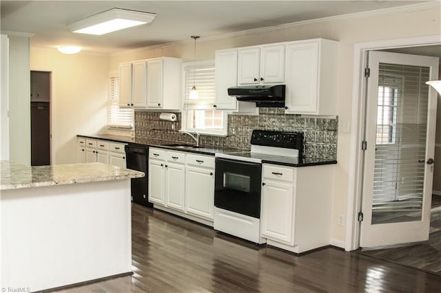 kitchen featuring dishwasher, pendant lighting, white electric range oven, white cabinetry, and dark stone countertops