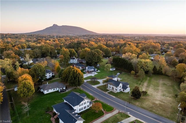 aerial view at dusk with a mountain view