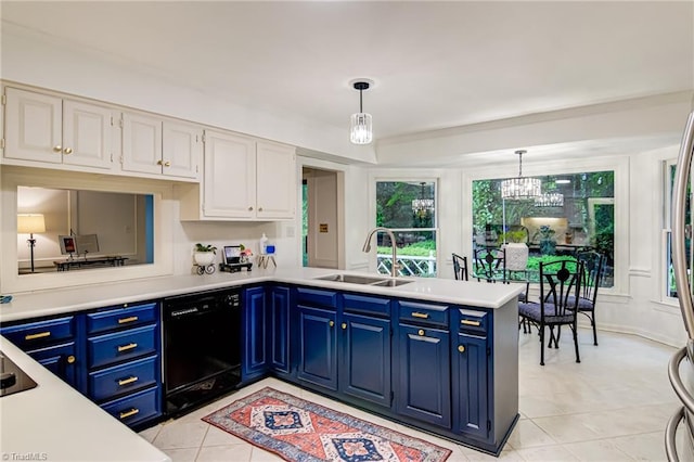 226 Cedar Trl, Winston-Salem, NC 27104 - kitchen with black dishwasher, a sink, white cabinets, a peninsula, and light countertops