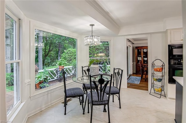 226 Cedar Trl, Winston-Salem, NC 27104 - dining area with a chandelier and crown molding