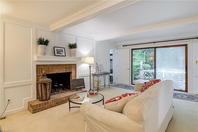 226 Cedar Trl, Winston-Salem, NC 27104 - carpeted living room featuring crown molding, a decorative wall, and a brick fireplace