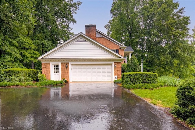 226 Cedar Trl, Winston-Salem, NC 27104 - garage featuring asphalt driveway