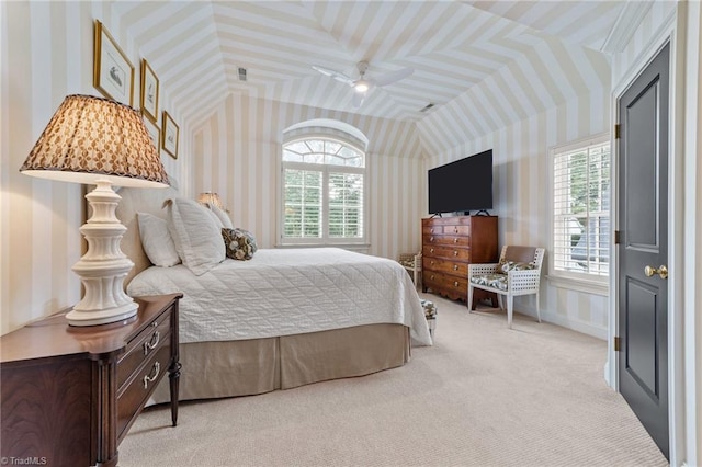 2990 Reynolds Sq, Winston-Salem, NC 27106 - bedroom featuring wallpapered walls, multiple windows, light colored carpet, vaulted ceiling, and ceiling fan