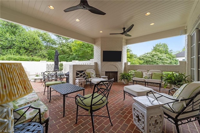 2990 Reynolds Sq, Winston-Salem, NC 27106 - view of patio featuring an outdoor living space with a fireplace and a ceiling fan
