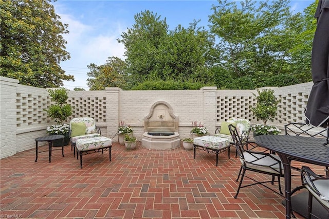 2990 Reynolds Sq, Winston-Salem, NC 27106 - fenced backyard with a patio
