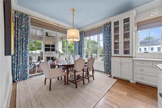 2990 Reynolds Sq, Winston-Salem, NC 27106 - dining space with crown molding and light wood-type flooring