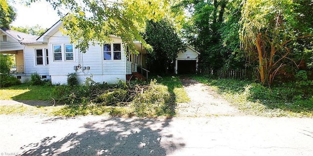 view of property exterior featuring driveway