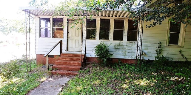 view of outbuilding featuring entry steps