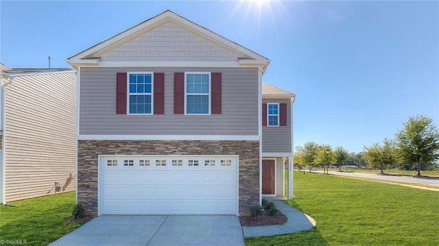 view of front of property with a garage and a front lawn