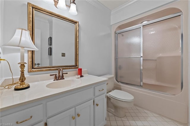 bathroom with crown molding, tile patterned flooring, vanity, toilet, and bath / shower combo with glass door