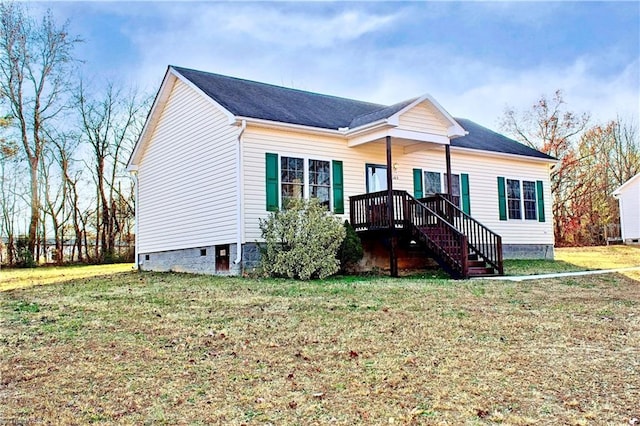 view of front facade featuring a front yard