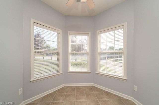 5306 Forester Dr, High Point, NC 27265 - empty room with a ceiling fan, tile patterned flooring, and baseboards