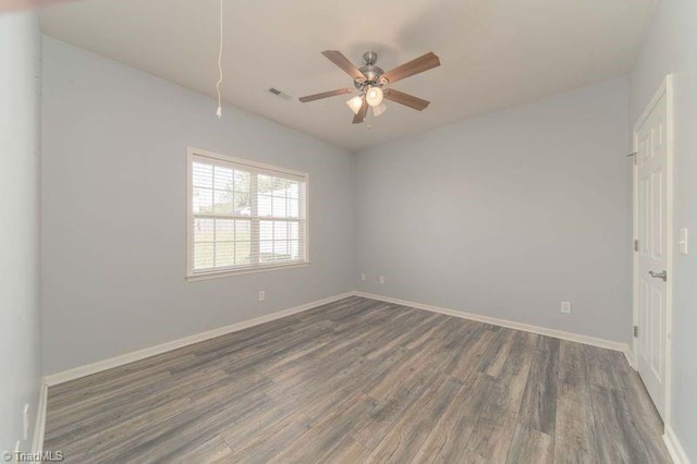 5306 Forester Dr, High Point, NC 27265 - empty room featuring wood finished floors, baseboards, and ceiling fan