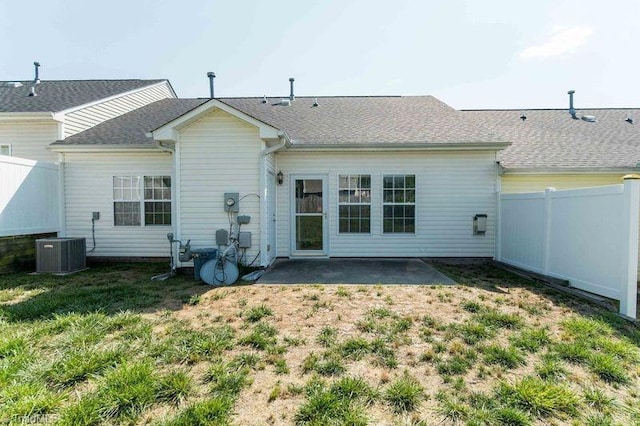 5306 Forester Dr, High Point, NC 27265 - rear view of house with central air condition unit and a patio