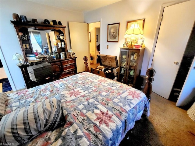 bedroom featuring carpet