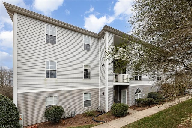 view of front of home with a balcony