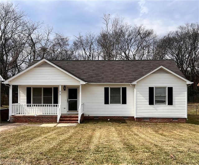 ranch-style house featuring crawl space, roof with shingles, a porch, and a front yard