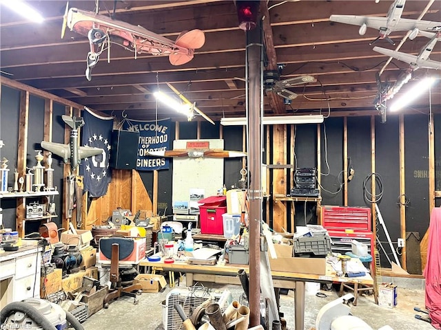 basement with a workshop area