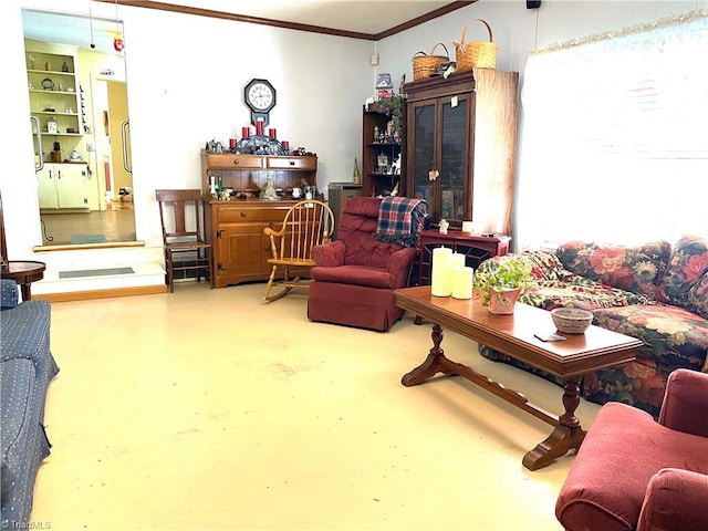 living room with concrete flooring and ornamental molding