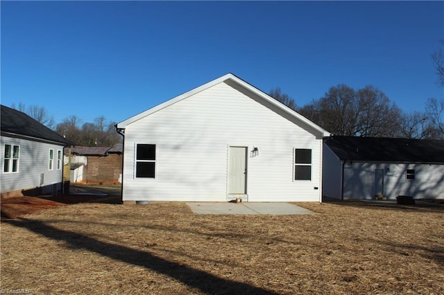 back of house featuring a patio area