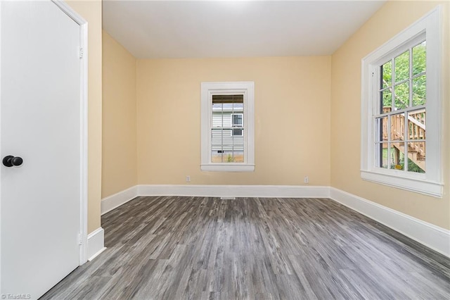 2515 N Patterson Ave, Winston-Salem, NC 27105 - unfurnished room featuring plenty of natural light, dark wood-style flooring, and baseboards