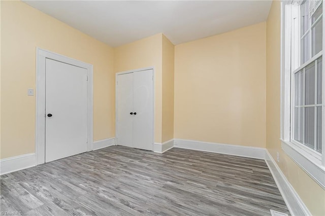 2515 N Patterson Ave, Winston-Salem, NC 27105 - unfurnished room featuring wood finished floors and baseboards