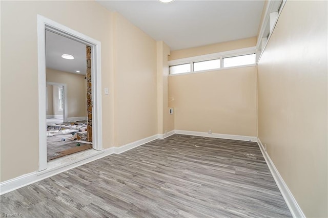 2515 N Patterson Ave, Winston-Salem, NC 27105 - unfurnished room with wood finished floors and baseboards