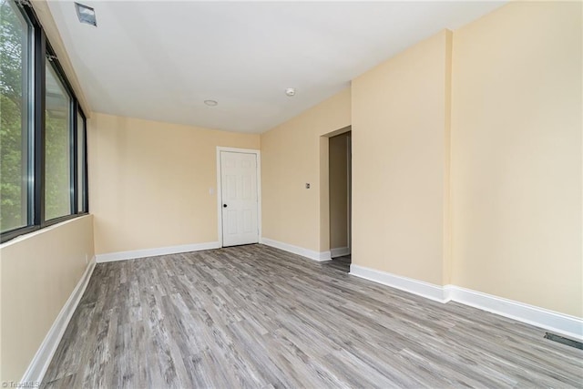 2515 N Patterson Ave, Winston-Salem, NC 27105 - empty room with wood finished floors and baseboards