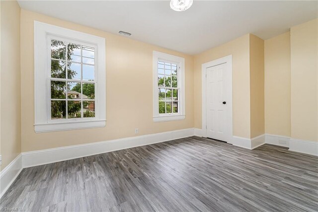 2515 N Patterson Ave, Winston-Salem, NC 27105 - empty room featuring wood finished floors and baseboards