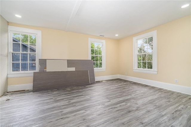 2515 N Patterson Ave, Winston-Salem, NC 27105 - spare room featuring healthy amount of natural light, baseboards, wood finished floors, and recessed lighting