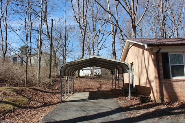 177 Duke Rd, Mount Airy, NC 27030 - exterior space featuring a carport, brick siding, and driveway