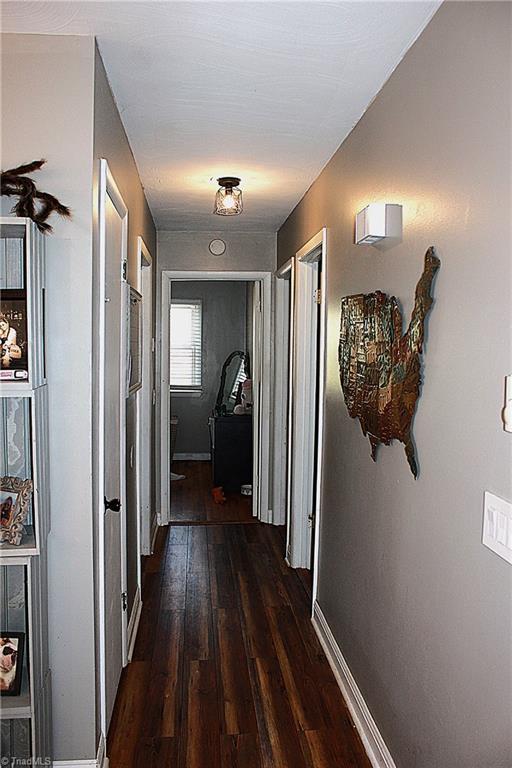 177 Duke Rd, Mount Airy, NC 27030 - corridor featuring dark wood-style floors and baseboards