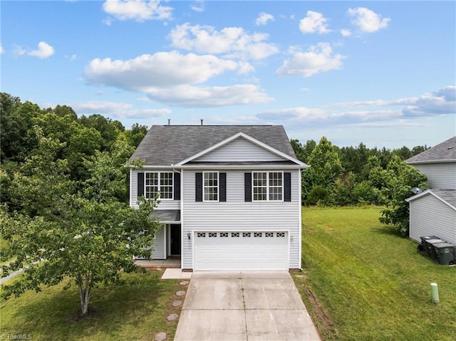 4908 Peppercorn Ln, Greensboro, NC 27406 - traditional home featuring driveway, an attached garage, and a front yard