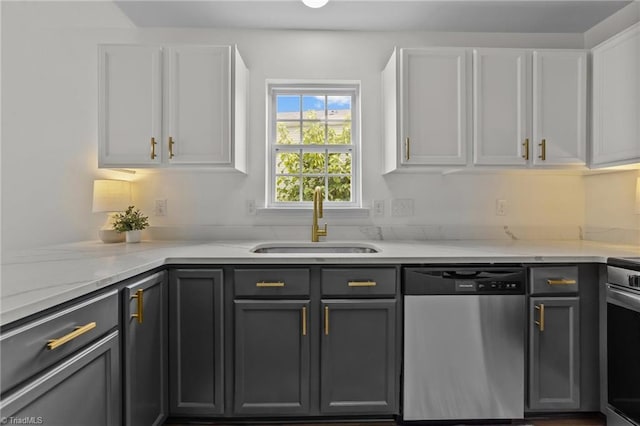 4908 Peppercorn Ln, Greensboro, NC 27406 - kitchen featuring dishwasher, white cabinets, and light stone counters