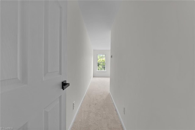 4908 Peppercorn Ln, Greensboro, NC 27406 - corridor featuring light colored carpet and baseboards