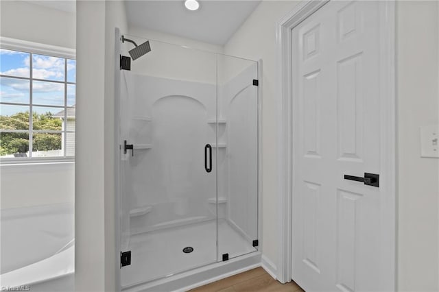 4908 Peppercorn Ln, Greensboro, NC 27406 - bathroom with a shower stall and wood finished floors