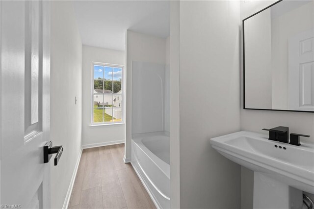 4908 Peppercorn Ln, Greensboro, NC 27406 - full bath with baseboards and bathtub / shower combination