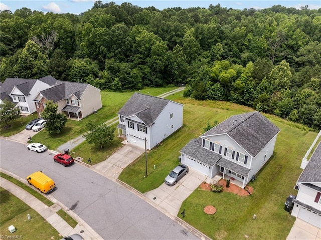 4908 Peppercorn Ln, Greensboro, NC 27406 - aerial perspective of suburban area featuring a forest