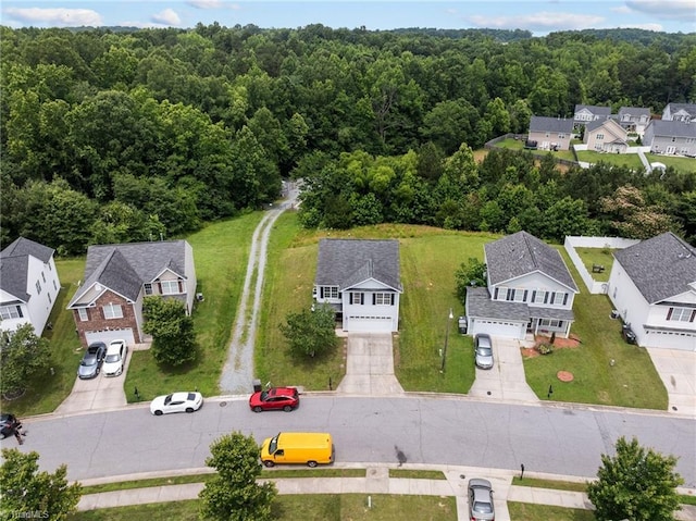 4908 Peppercorn Ln, Greensboro, NC 27406 - aerial perspective of suburban area featuring a forest