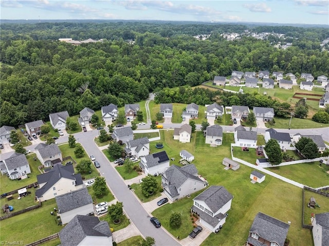 4908 Peppercorn Ln, Greensboro, NC 27406 - aerial perspective of suburban area with a heavily wooded area