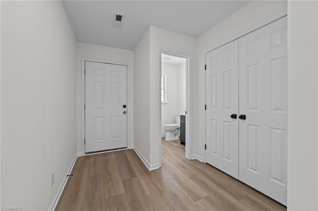4908 Peppercorn Ln, Greensboro, NC 27406 - foyer entrance with light wood finished floors